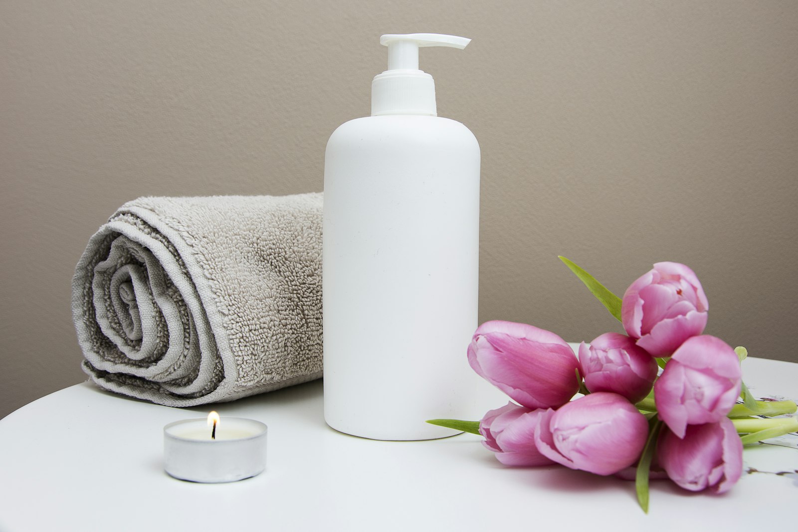 A treatment room at the Cedar Lodge spa, dressed in linen and cedar